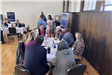 Group Discussion at a Table at the Economic Development Summit