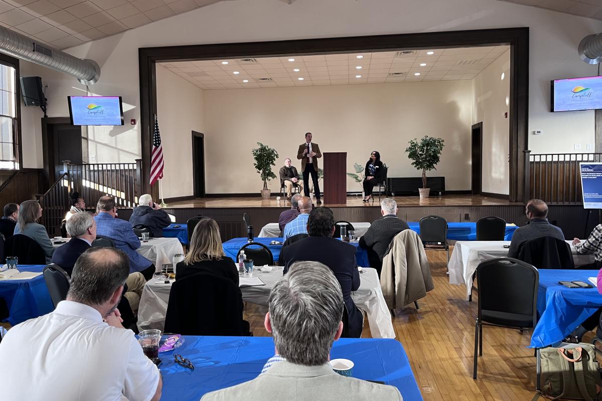 Speakers on stage at the Economic Development Summit